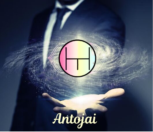 Person in suit holding glowing light with a circular symbol and the name 'Antojai' below.