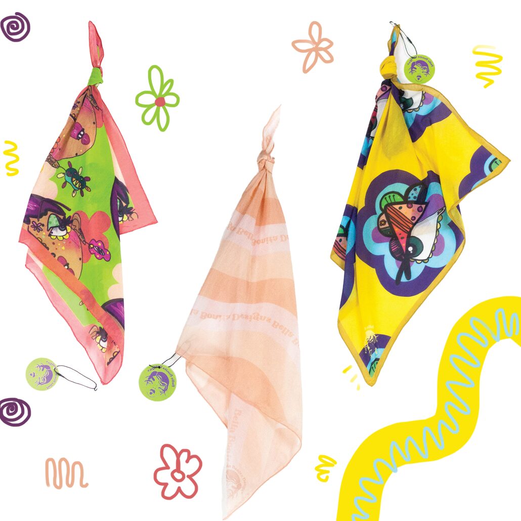 Three colorful scarves hanging, with doodles of flowers and squiggly lines around them.