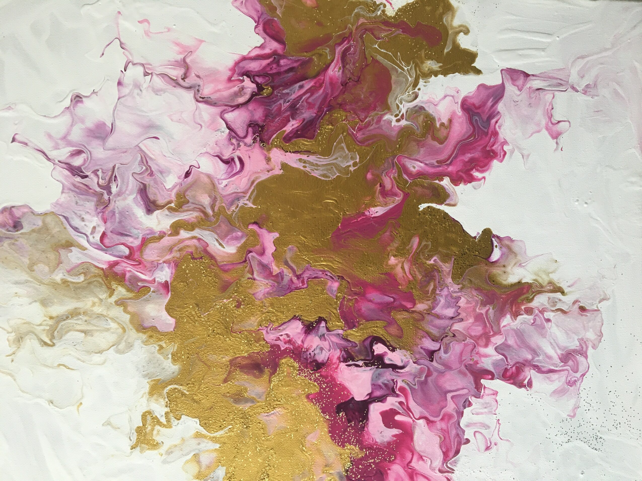 Abstract painting with pink, gold, and white swirling colors.