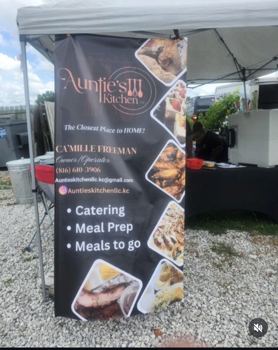 Vertical banner advertising Auntie's Kitchen with images of food, listing catering, meal prep, and meals to go, contact info included.