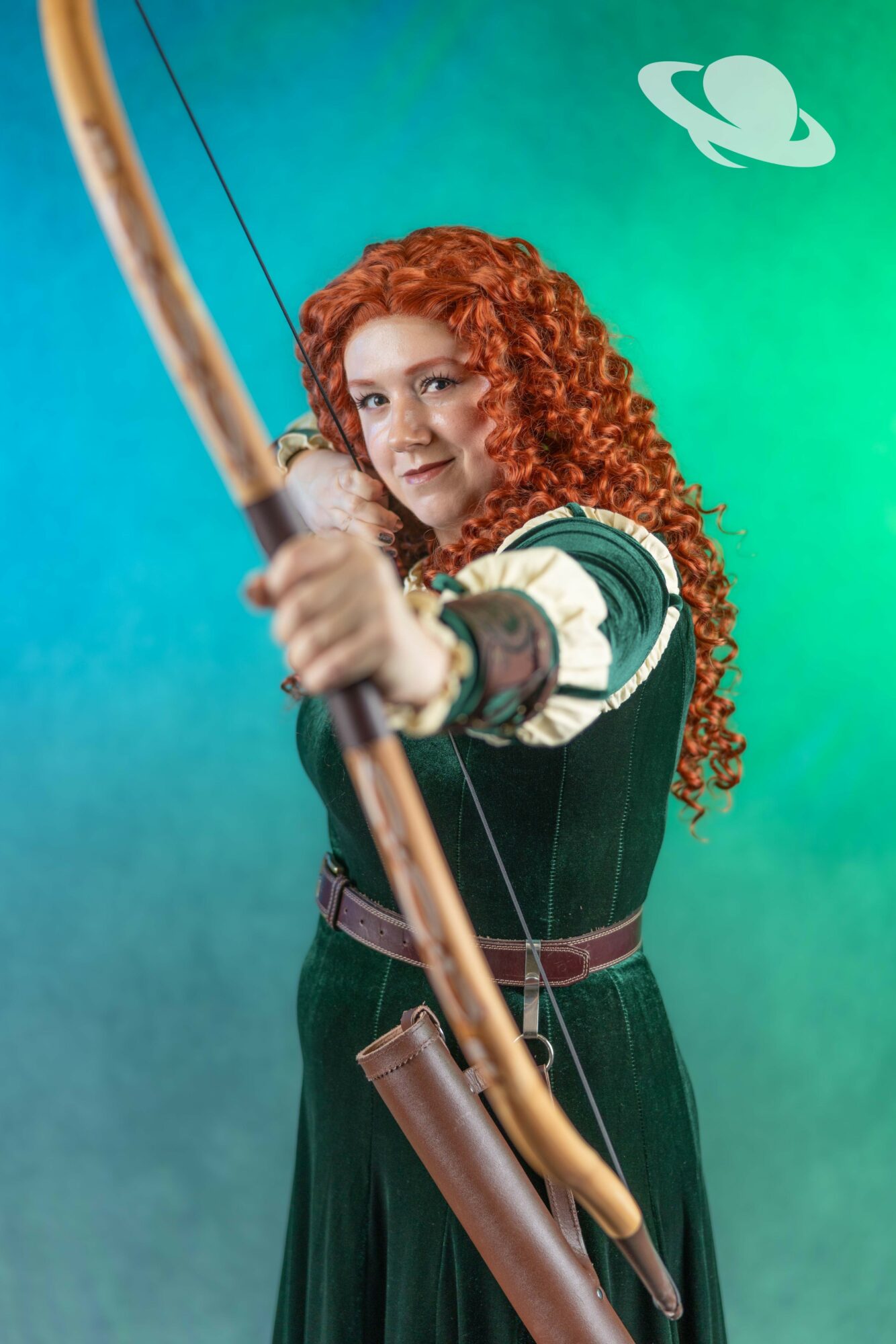 Young woman with curly red hair aiming a bow and arrow, with a planet and starry background.