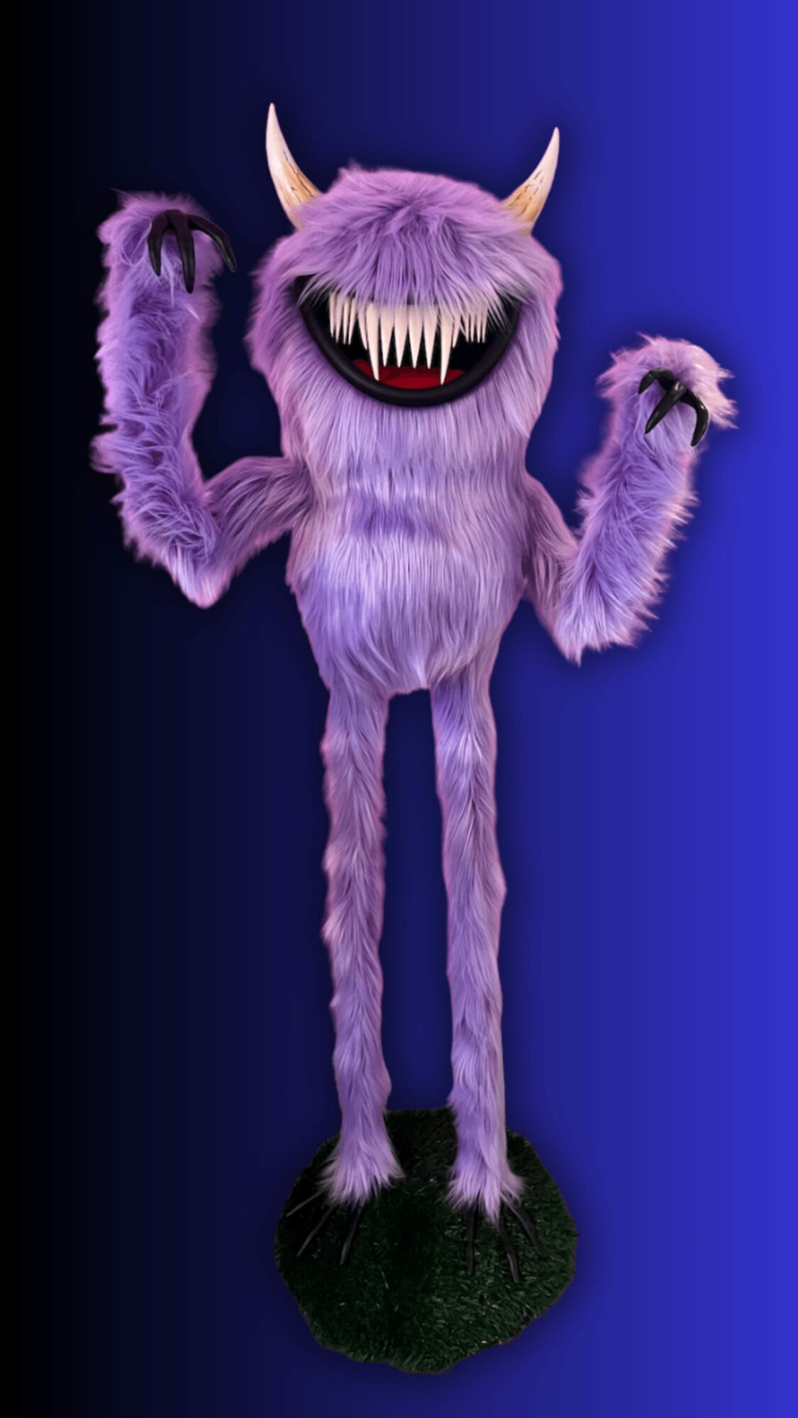 Purple furry monster with horns, sharp teeth, and long limbs, standing on a grassy base against a blue background.
