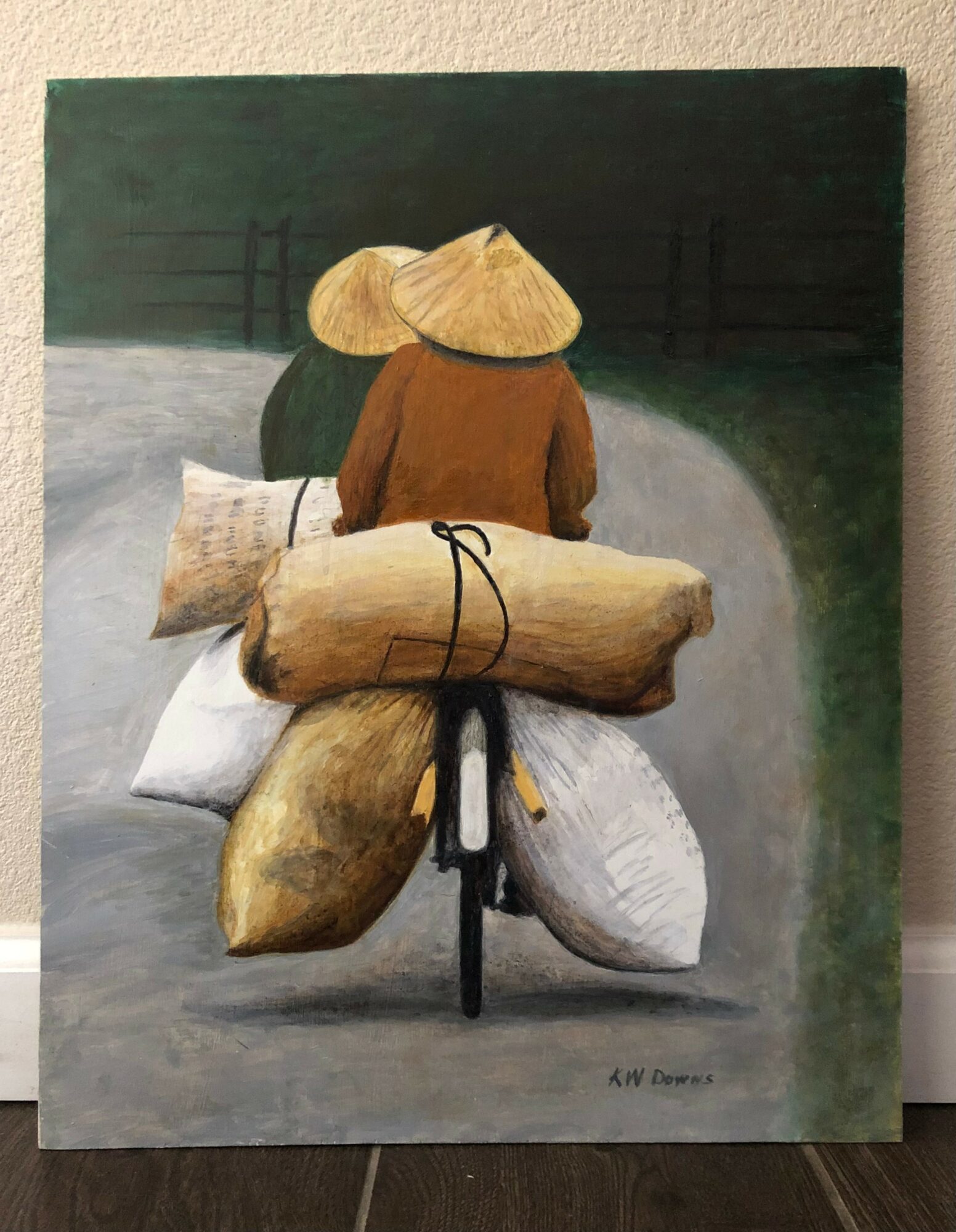 A painting of a person riding a bicycle carrying large bundles and wearing a conical hat, viewed from behind.