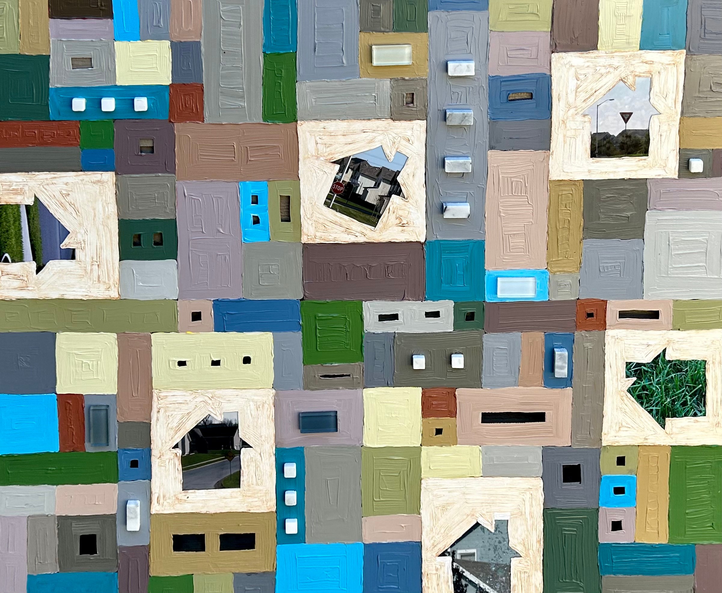 A collage of small, colorful, rectangular and square images with some black and white photos, arranged in a grid pattern.