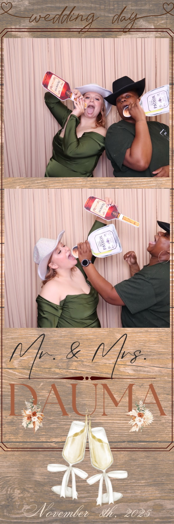 Two women wearing hats and holding drinks, celebrating at a wedding, with a wooden backdrop and decorative text.