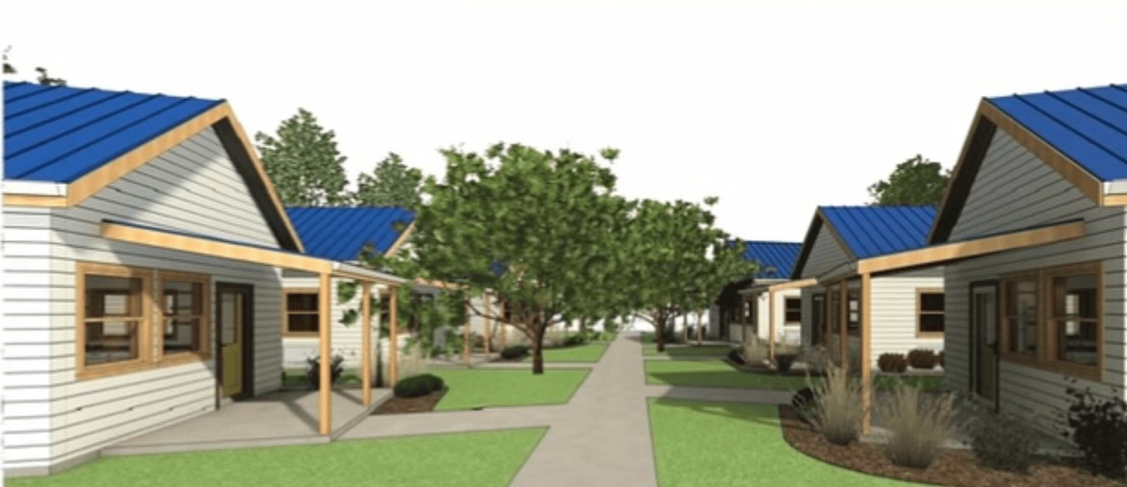 Residential neighborhood with houses, trees, and a walkway, viewed from the front, daytime.