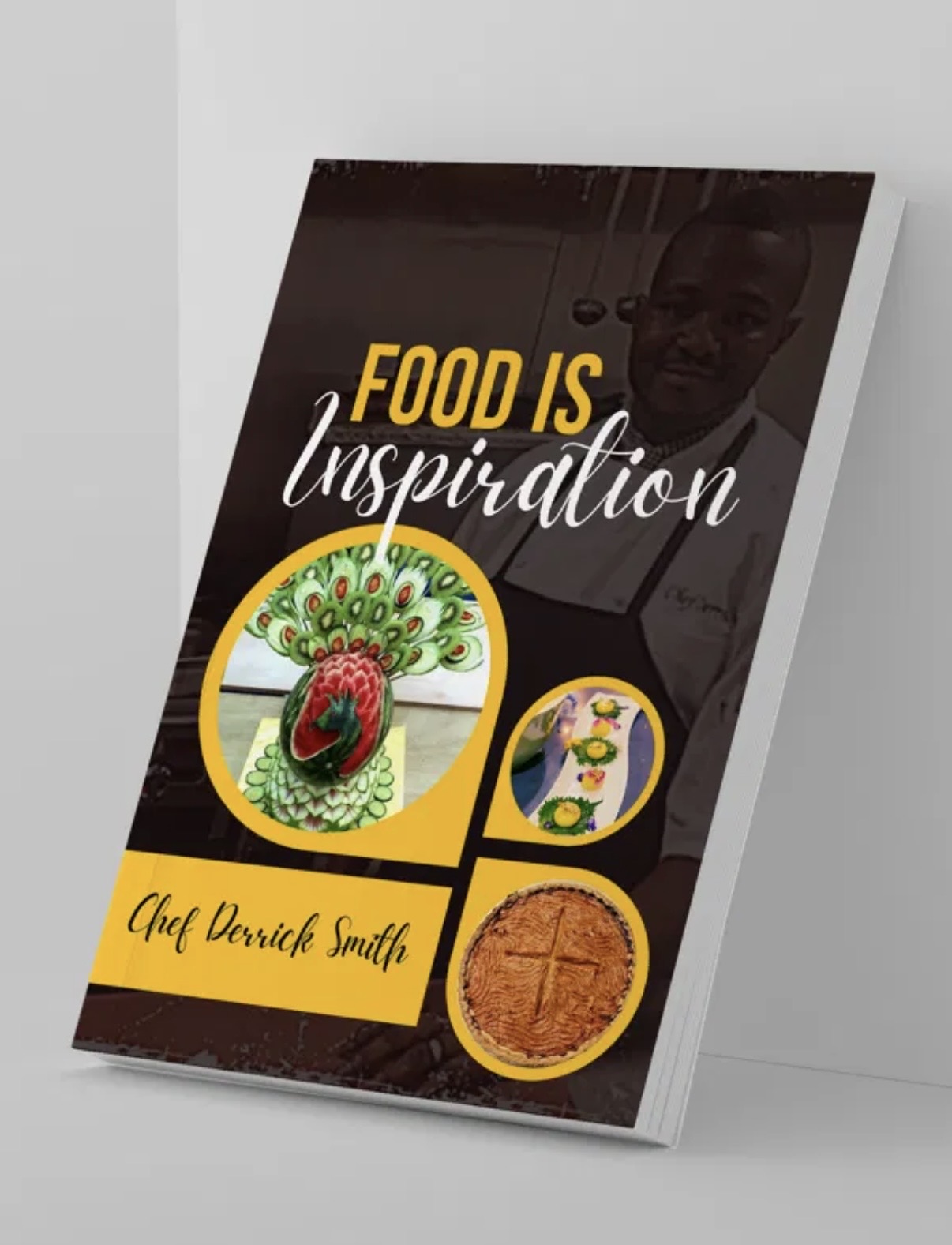 Book cover titled 'Food is Inspiration' with images of a peacock, a cake, and a pie, and the author's name, Chef Drenick Smith.