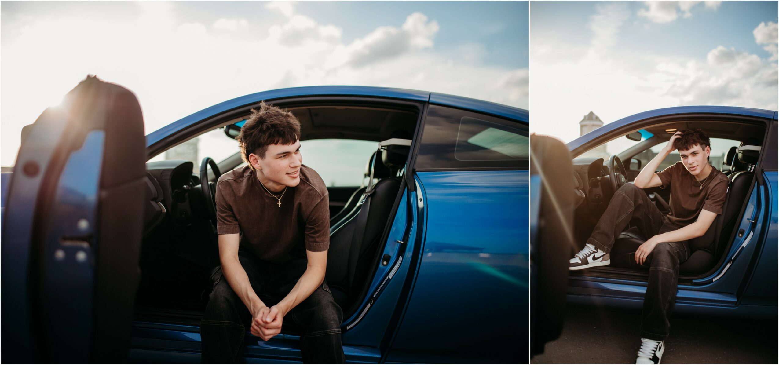 Young man sitting in a blue car with the door open, outdoors under a partly cloudy sky.