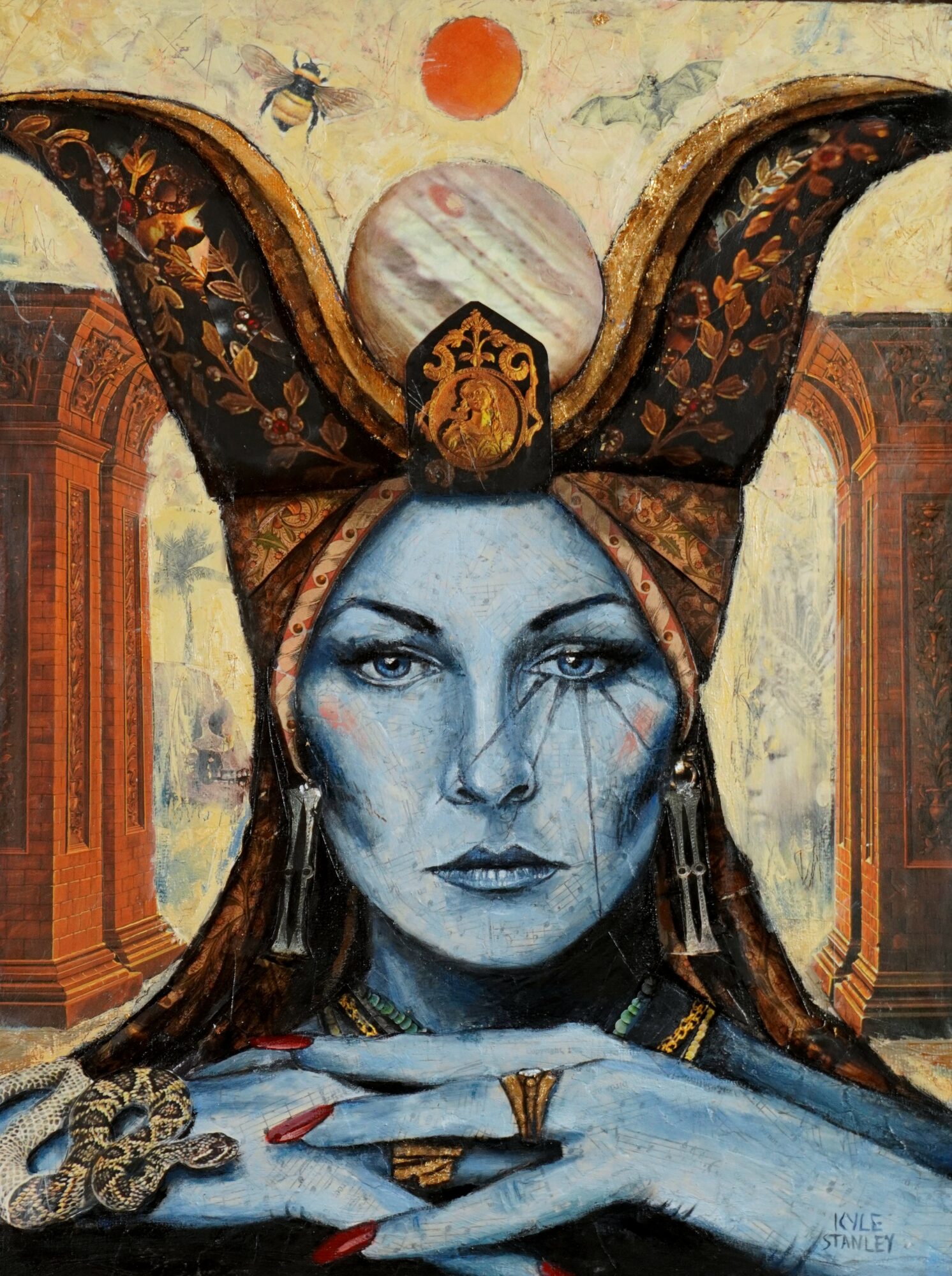Portrait of a woman with blue skin, elaborate headpiece, and jewelry, set against a decorative background.