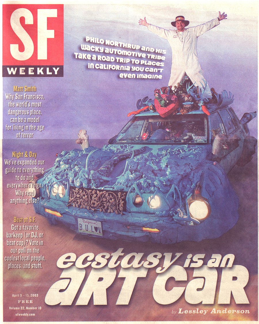 Person standing on a decorated car with a person in a white outfit and hat, holding a bouquet, on top of the car.