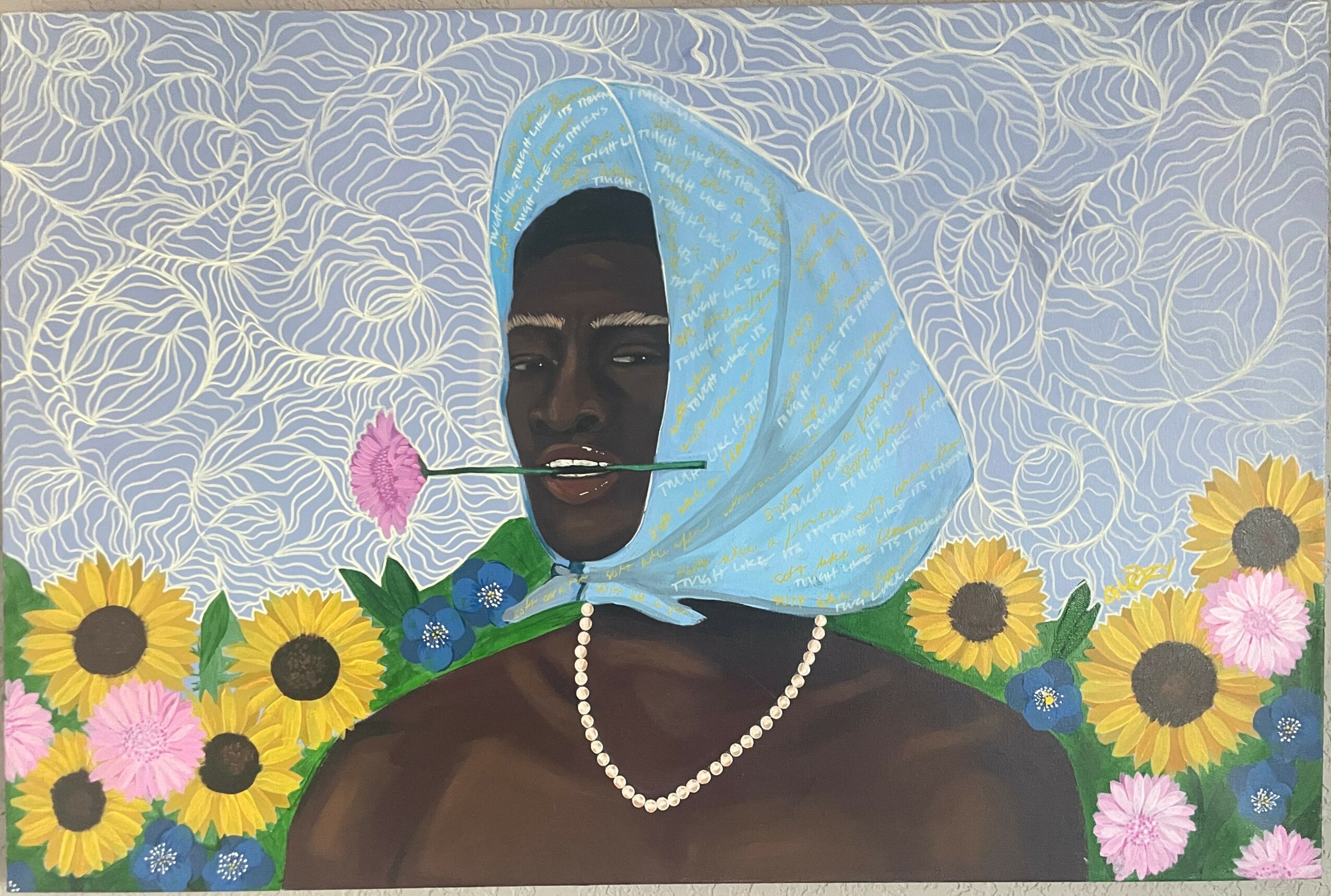 Portrait of a woman with dark skin, wearing a blue headscarf, pearl necklace, surrounded by sunflowers and pink flowers.