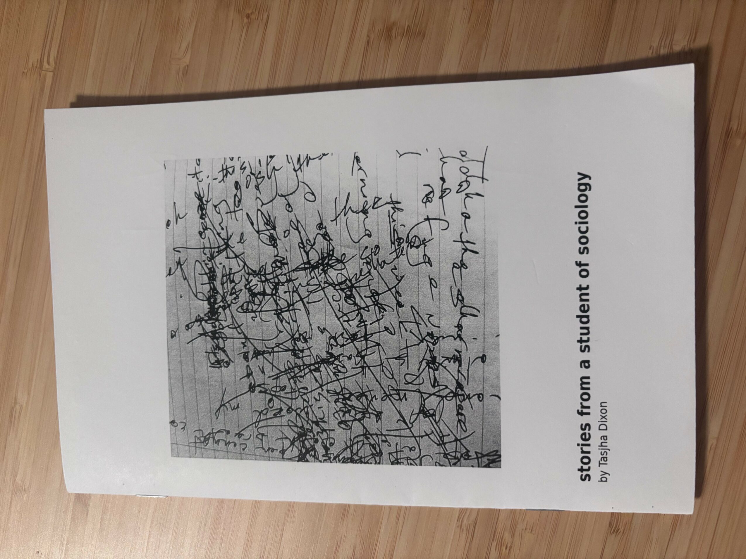 Book cover with a black and white handwritten note or drawing, titled 'stories from a student of sociology'.